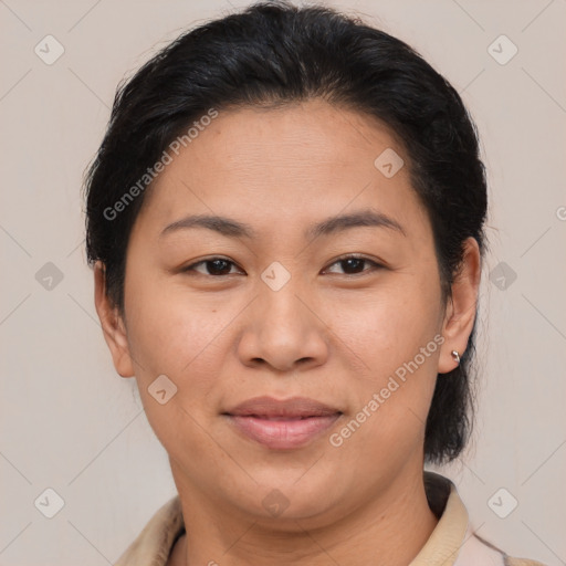 Joyful asian young-adult female with short  brown hair and brown eyes