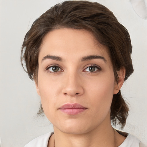 Neutral white young-adult female with medium  brown hair and brown eyes