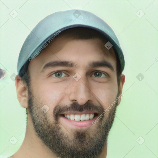 Joyful white young-adult male with short  brown hair and green eyes