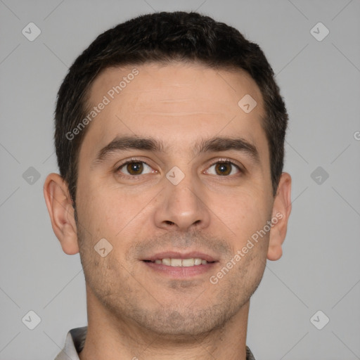 Joyful white young-adult male with short  brown hair and brown eyes