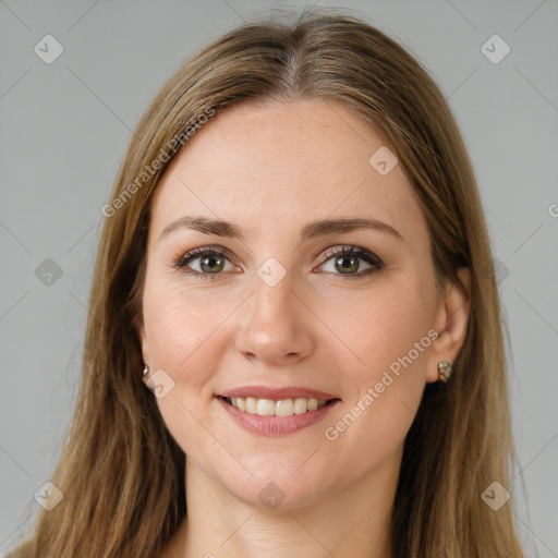 Joyful white young-adult female with long  brown hair and brown eyes