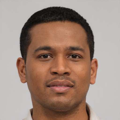 Neutral latino young-adult male with short  brown hair and brown eyes