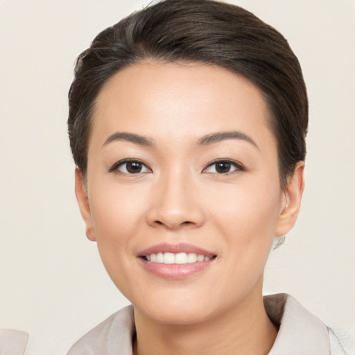 Joyful white young-adult female with medium  brown hair and brown eyes