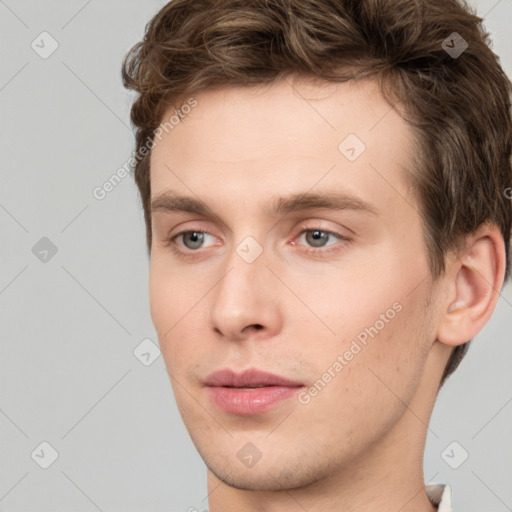 Neutral white young-adult male with short  brown hair and grey eyes