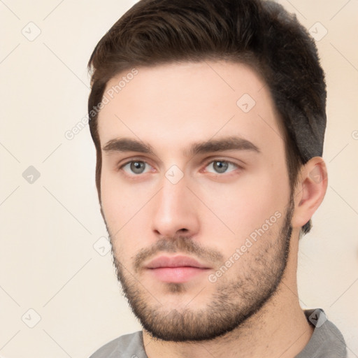 Neutral white young-adult male with short  brown hair and brown eyes