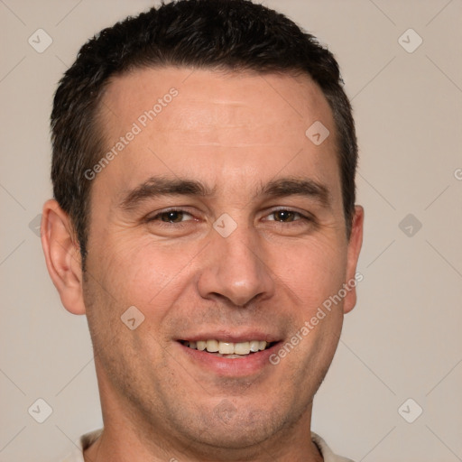 Joyful white adult male with short  brown hair and brown eyes