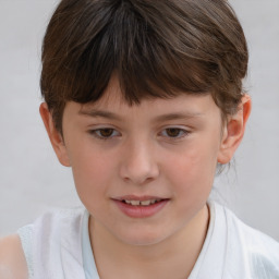 Joyful white child female with medium  brown hair and brown eyes