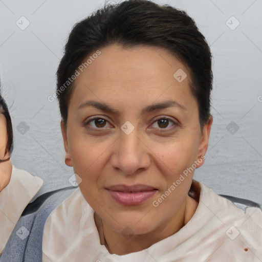 Joyful white adult female with short  brown hair and brown eyes