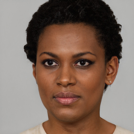 Neutral black young-adult female with short  brown hair and brown eyes