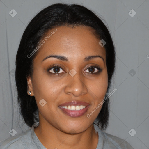 Joyful black young-adult female with medium  brown hair and brown eyes