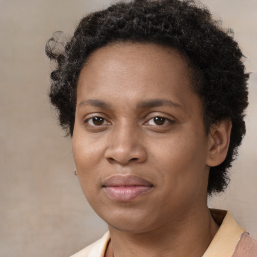 Neutral black young-adult female with short  brown hair and brown eyes