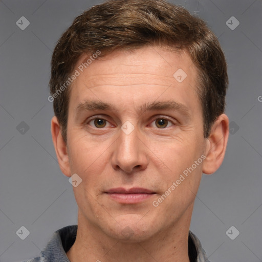 Joyful white adult male with short  brown hair and grey eyes