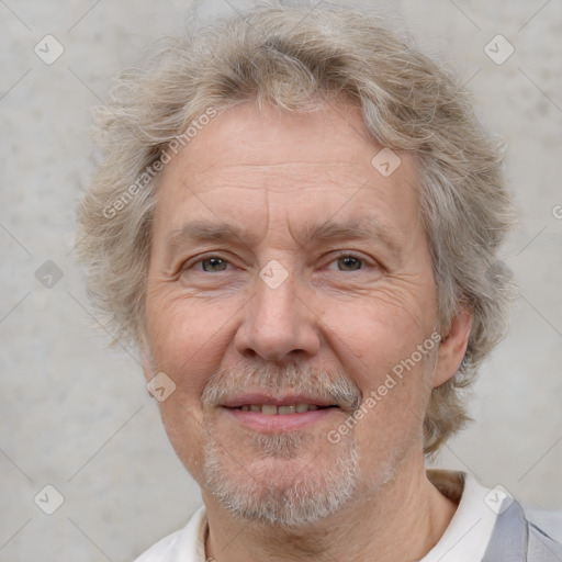 Joyful white middle-aged male with short  brown hair and brown eyes