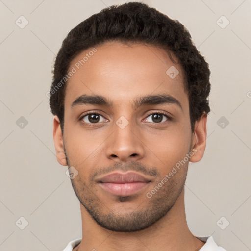 Neutral white young-adult male with short  black hair and brown eyes