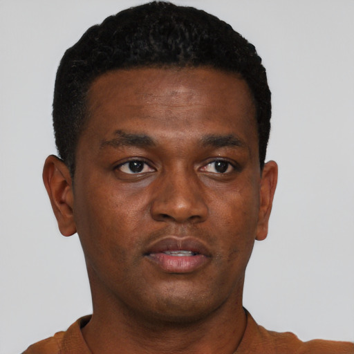 Neutral black young-adult male with short  brown hair and brown eyes