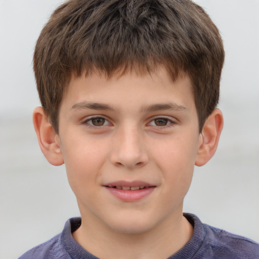 Joyful white child male with short  brown hair and brown eyes