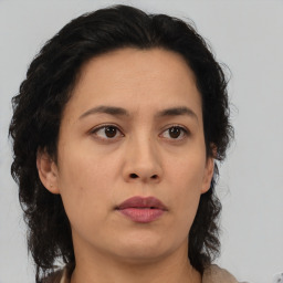 Neutral asian young-adult female with medium  brown hair and brown eyes