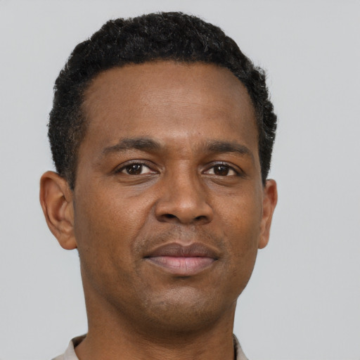 Neutral black young-adult male with short  brown hair and brown eyes