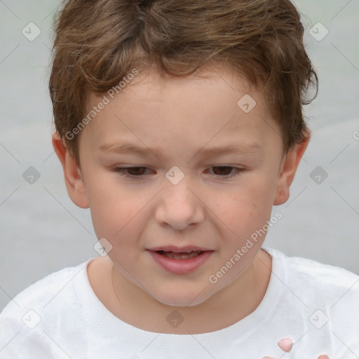 Joyful white child male with short  brown hair and brown eyes