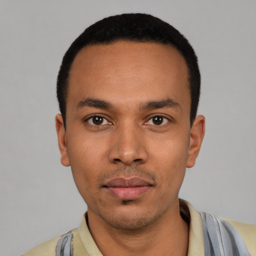 Neutral latino young-adult male with short  black hair and brown eyes