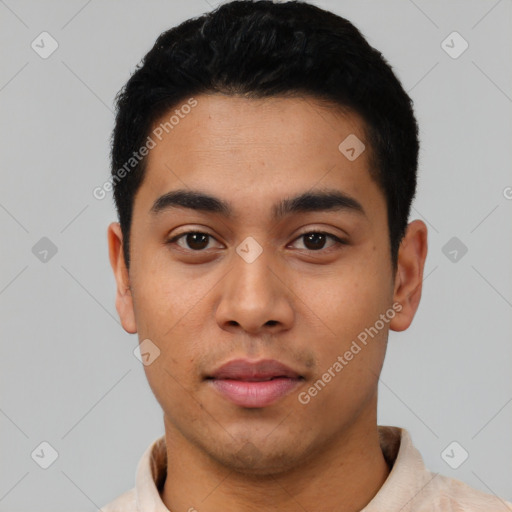 Neutral latino young-adult male with short  black hair and brown eyes