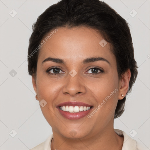 Joyful white young-adult female with short  brown hair and brown eyes