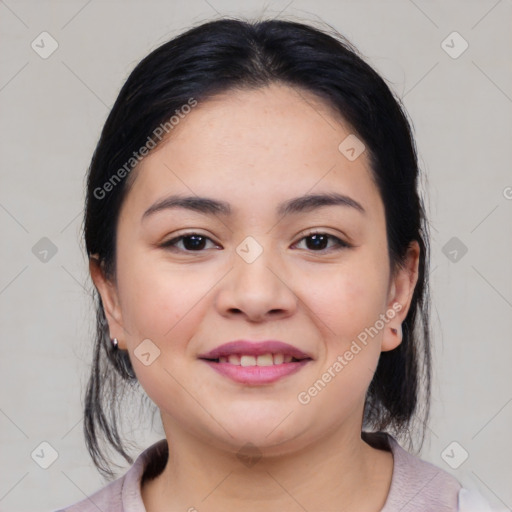 Joyful white young-adult female with medium  black hair and brown eyes