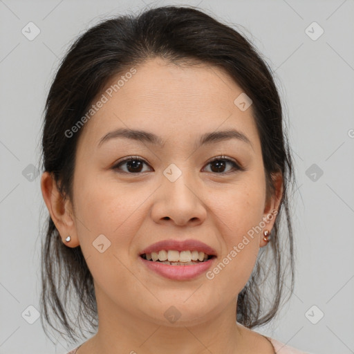 Joyful asian young-adult female with medium  brown hair and brown eyes