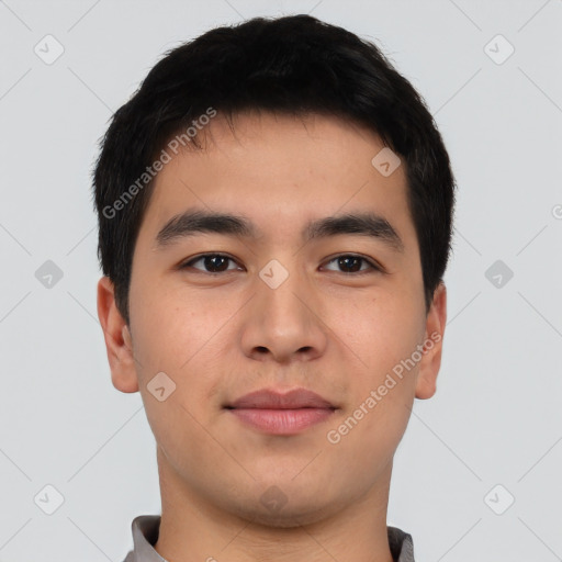 Joyful asian young-adult male with short  black hair and brown eyes