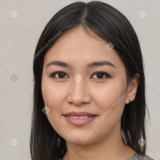 Joyful latino young-adult female with medium  brown hair and brown eyes