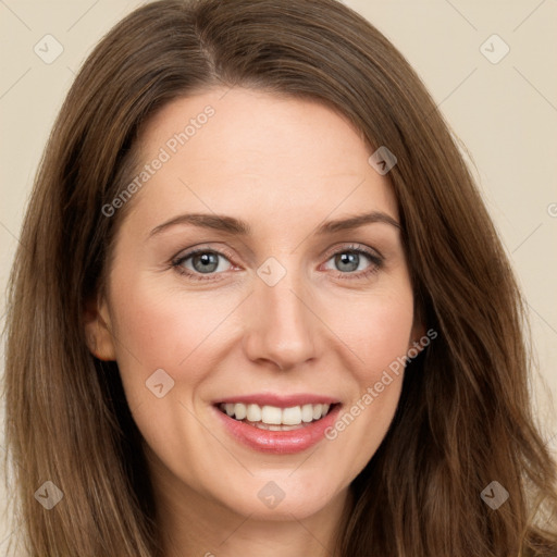 Joyful white young-adult female with long  brown hair and green eyes