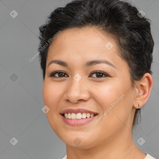 Joyful white young-adult female with short  brown hair and brown eyes