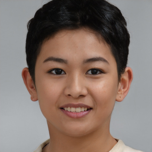 Joyful asian young-adult female with short  brown hair and brown eyes