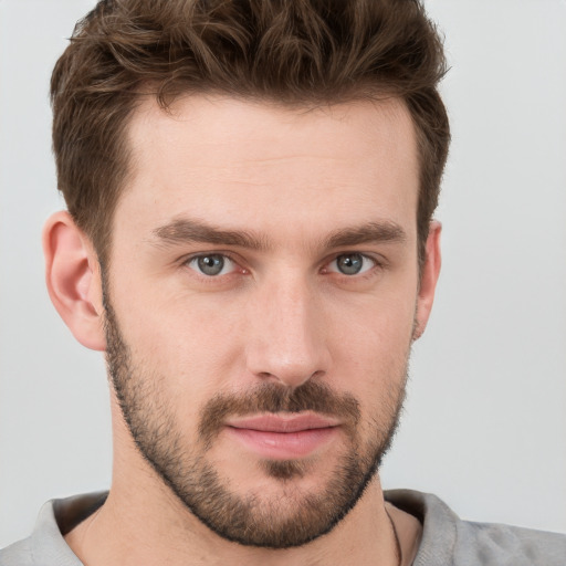 Neutral white young-adult male with short  brown hair and grey eyes