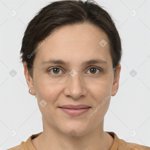 Joyful white adult female with short  brown hair and brown eyes