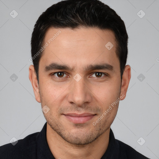 Joyful white young-adult male with short  black hair and brown eyes