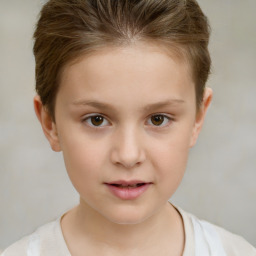 Joyful white child female with short  brown hair and brown eyes