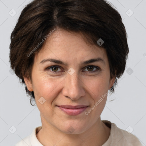 Joyful white adult female with short  brown hair and brown eyes