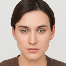 Neutral white young-adult female with short  brown hair and brown eyes