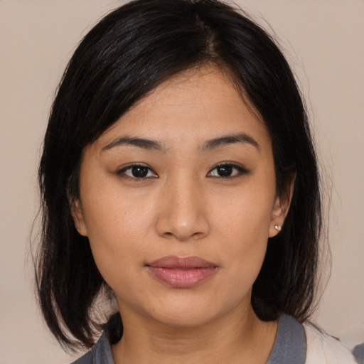 Neutral asian young-adult female with medium  brown hair and brown eyes