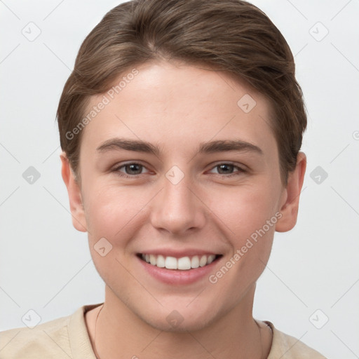 Joyful white young-adult female with short  brown hair and grey eyes