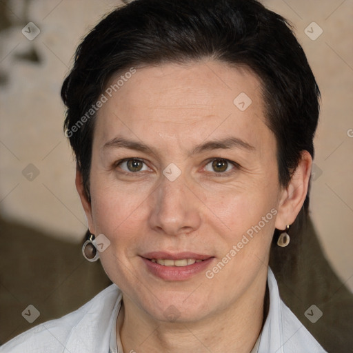 Joyful white adult female with short  brown hair and brown eyes