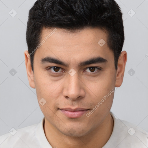 Joyful latino young-adult male with short  brown hair and brown eyes