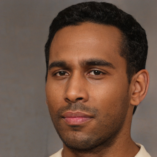 Neutral black young-adult male with short  black hair and brown eyes