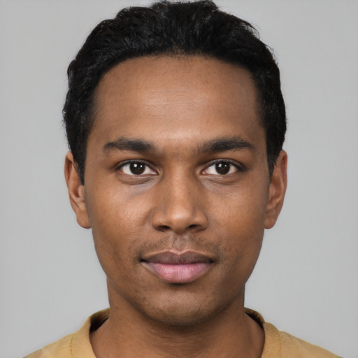 Neutral black young-adult male with short  black hair and brown eyes