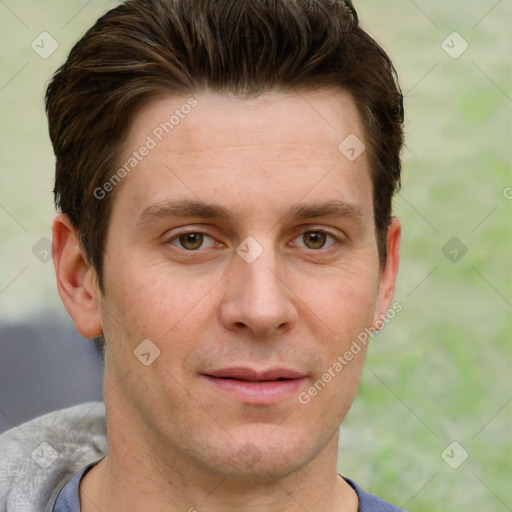 Joyful white adult male with short  brown hair and grey eyes