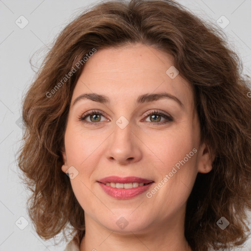 Joyful white young-adult female with medium  brown hair and green eyes