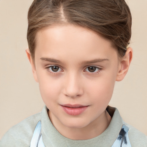 Joyful white child female with short  brown hair and brown eyes