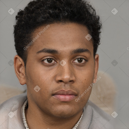 Neutral black young-adult male with short  brown hair and brown eyes