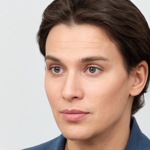 Joyful white young-adult male with medium  brown hair and brown eyes